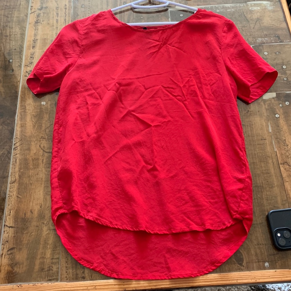 Bright red blouse